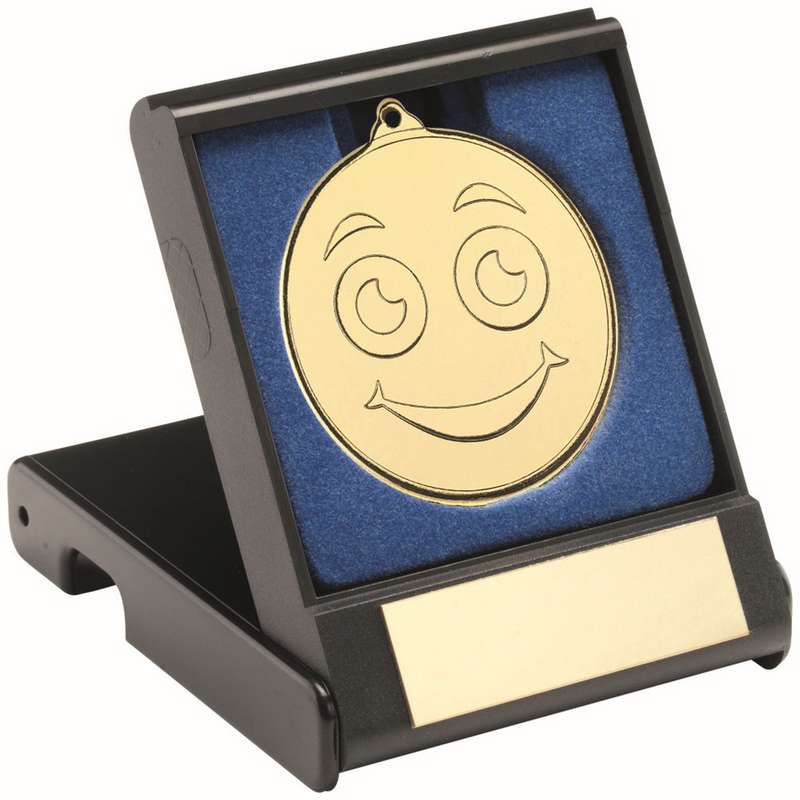 BLACK PLASTIC BOX WITH 50mm GOLD SMILEY FACE MEDAL TROPHY – 3.5in